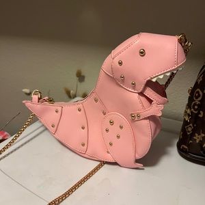 Pink dinosaur purse